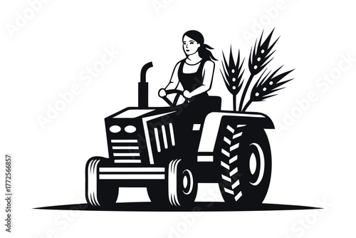 Black silhouette shows a woman driving a tractor with harvested wheat behind her