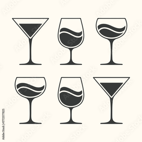 Collection of six different wine and cocktail glasses with dark liquid, isolated on a light background