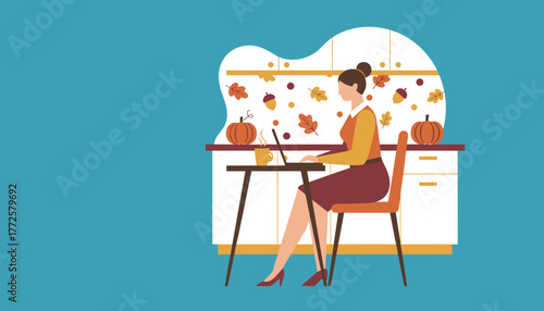 Woman working remotely on a laptop in a cozy decorated autumn home environment