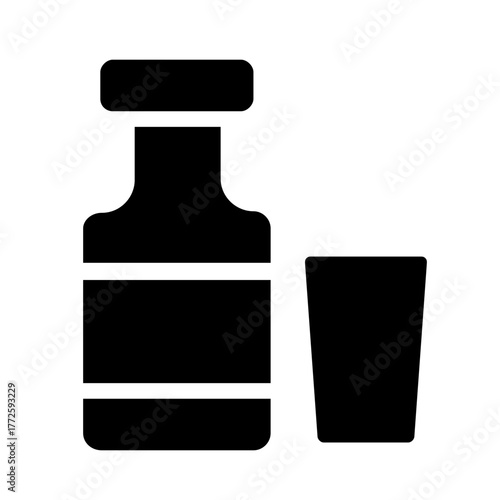 set of milk bottles with glass