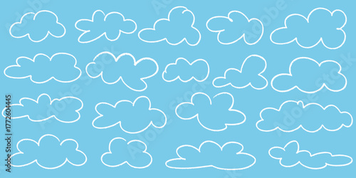 fluffy light clouds drawn in white chalk on blue sky background set. Handdrawn textured outline cloud icons. Child illustrations of cute cozy clouds, vector elements