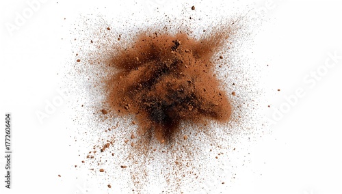 Brown dust and dry soil explosion against a white backdrop, potential allergen risk