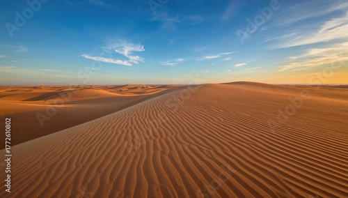 Fototapeta Naklejka Na Ścianę i Meble -  Maspalomas sand dunes under a sunny sky, showcasing summer travel and the beauty of nature