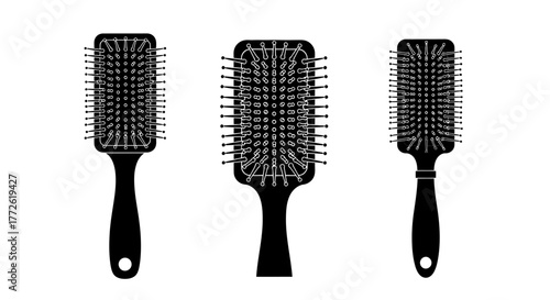 Three black hairbrushes with different designs shown in a linear arrangement