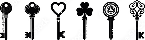 Ntique key collection on white, vintage style keys with heart, clover and circle designs