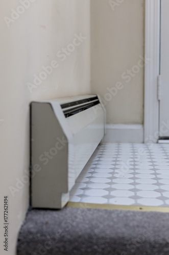 Installing Electric Radiator Covers For Energy Efficiency Measures.