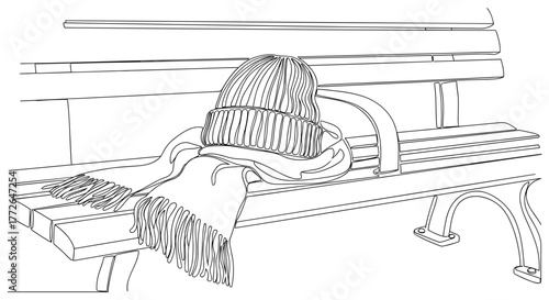 Person resting with head on bench wearing knit hat and scarf  