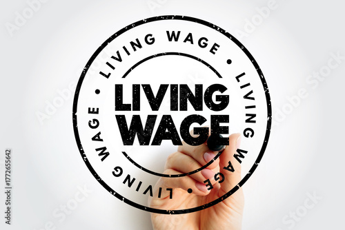 Obraz na plátně Living Wage is defined as the minimum income necessary for a worker to meet thei