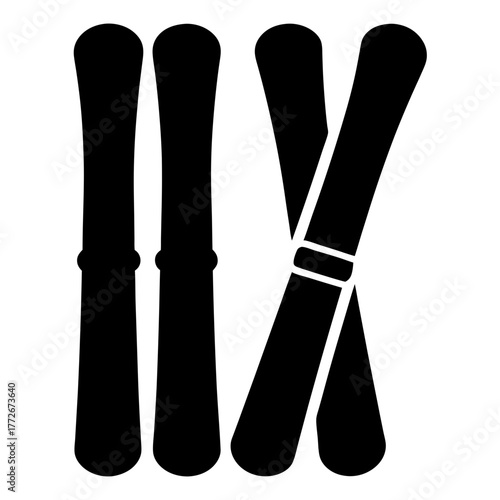 Four skis in a black and white graphic design for winter sports