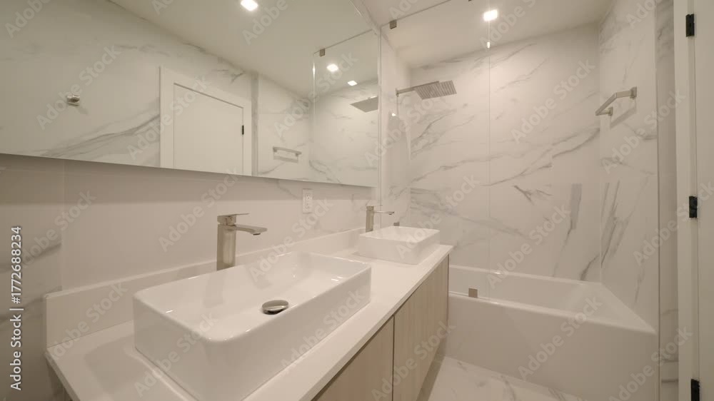 custom made wallpaper toronto digitalModern bathroom with clean white design. Two rectangular sinks with sleek faucets on light countertop. Large mirror stretches across wall above vanity