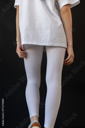 Model wearing white leggings highlighting shape, Mockup presenting waist and overall contour clearly