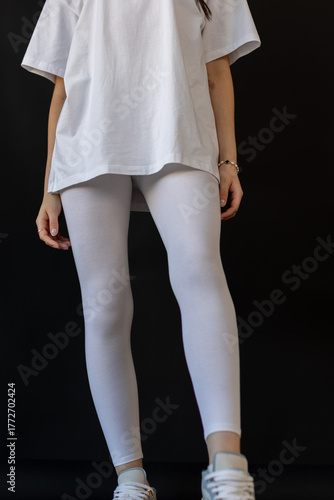 Model wearing white leggings highlighting shape, Mockup presenting waist and overall contour clearly