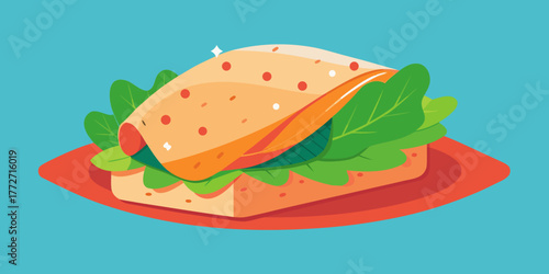 Sandwich wrapped in reusable food wrap on a colorful plate  