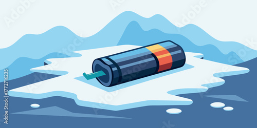 Used battery lying on melting snow with a blue background  