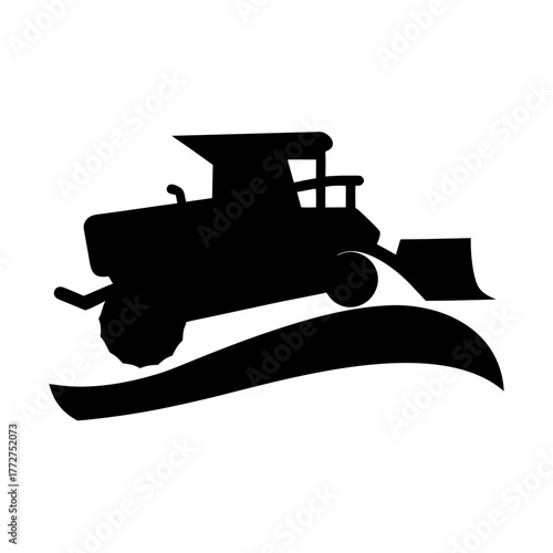Tractor pushing dirt in a stylized silhouette