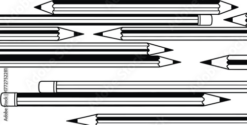 Collection of sharpened graphite pencils arranged in a creative pattern, ready for drawing and writing.