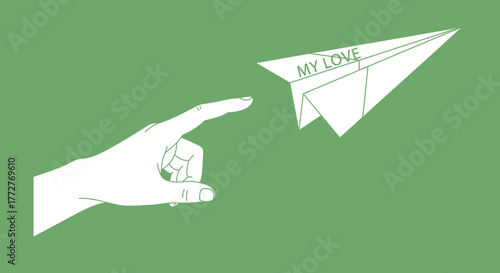 Paper plane with romantic message and pointing hand against solid green background, concept of