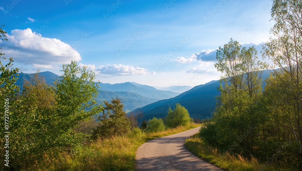 Fototapeta premium Scenic trail winding through mountainous landscape, natural beauty, Earth Day