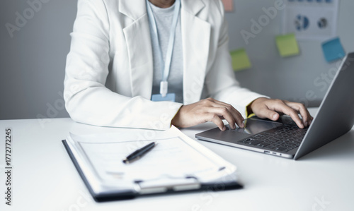 Business woman employer holding resume hiring recruit looking cv resume to hire candidates, analyzing information before job interview. Recruitment concepts