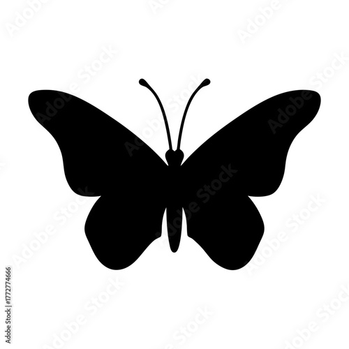 Silhouette of a butterfly with open wings against a white background design