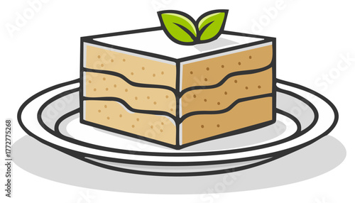 Layered Sponge Cake Slice Topped with Green Leaves Served on White Plate