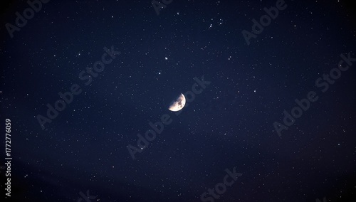 Crescent moon shining in th...