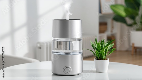 Wallpaper Mural Elegant silver humidifier paired with green plant on table, enhancing air quality Torontodigital.ca