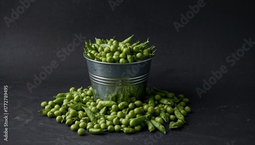 Bucket filled with green pe...