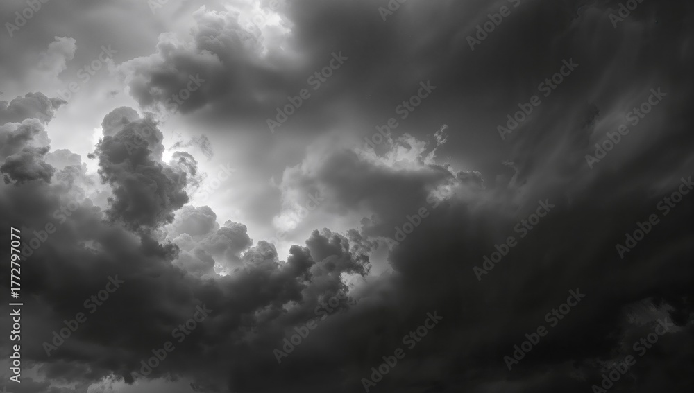 Obraz premium Monochrome clouds in shades of black and white, suitable for design backgrounds
