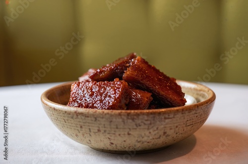 Bowl of glazed pork belly, ...