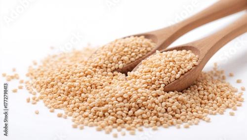 Buckwheat in wooden spoons,...