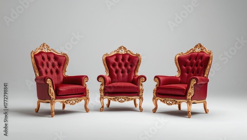 Three regal crimson chairs,...