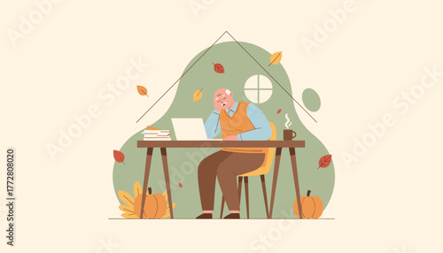 Tired senior man working remotely on a laptop at his desk during the fall season Stressful home office