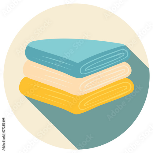 Stacked neatly folded textile fabrics in pastel colors with long shadows