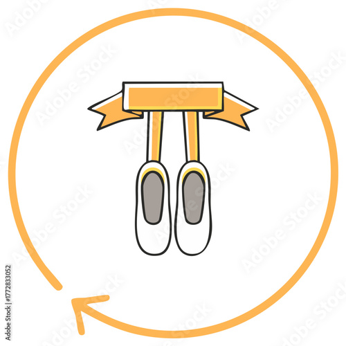 Ballet shoes hanging with ribbon inside yellow circle