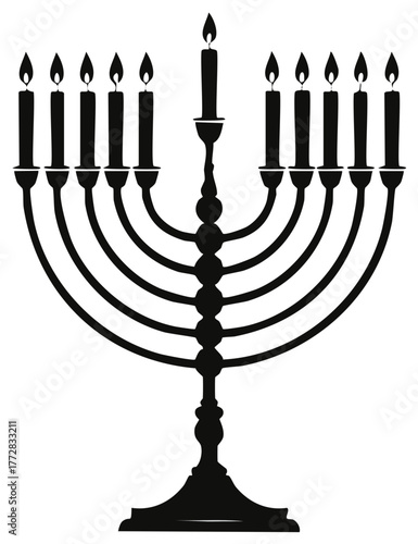 Traditional nine branched candelabrum with lit candles for Jewish celebration