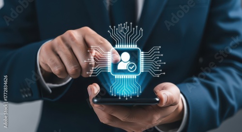 Person icon on microchip grid with businessman hand touching screen