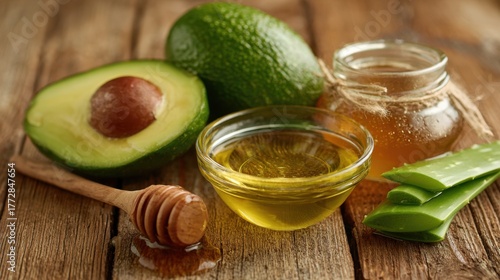 Wallpaper Mural Fresh avocado half honey jar olive oil and aloe vera on a wooden table showcasing natural skin care. Torontodigital.ca