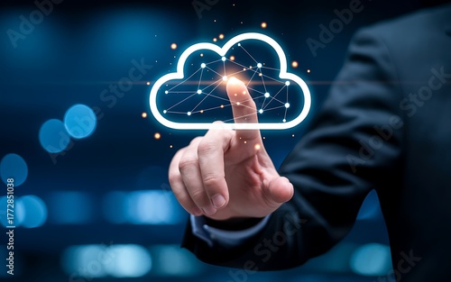 Businessman touching glowing cloud icon with network connections on dark background