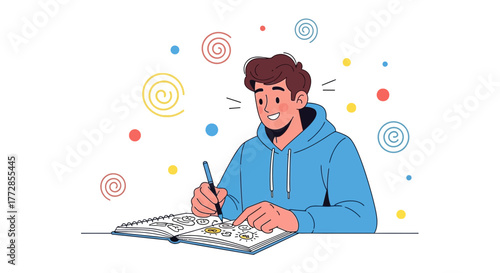 Creative Conceptualization: A Young Man Illustrating Ideas on Paper with Colorful Decorations