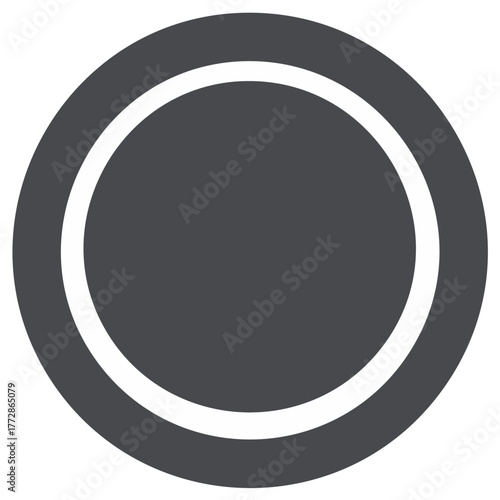 Abstract circular design element with concentric white rings on a dark gray background