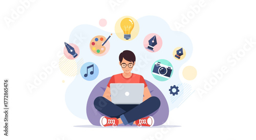 Creative Professional Working On Laptop With Artistic Elements And Digital Tools