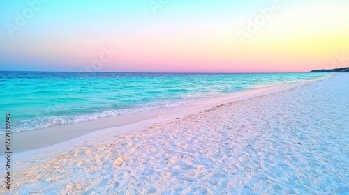 Tranquil beach sunset with soft pastel hues illuminating the serene ocean and sandy shores