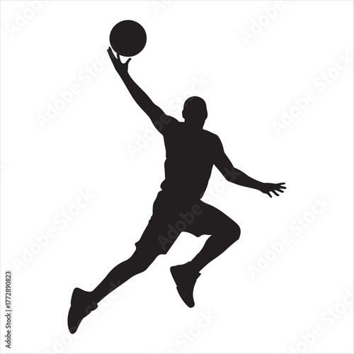 Silhouette of a basketball player jumping high in the air to shoot the ball during a game