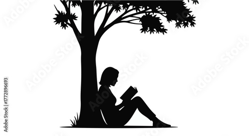 Silhouette of a person reading a book under a shady tree on a sunny day