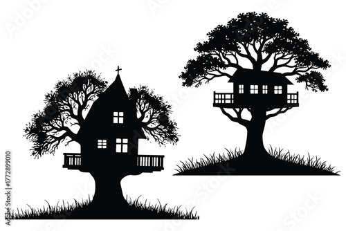 Two silhouette treehouses one with a cross on top black and white