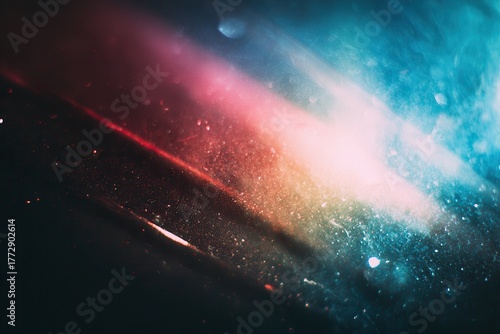 Wallpaper Mural A vibrant abstract image featuring a black background with a striking red and blue light leak gradient. Soft motion blur adds a sense of movement while dust particles enhance the ethereal atmosphere. Torontodigital.ca