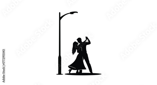 Romantic couple dancing joyfully under a solitary streetlamp at night