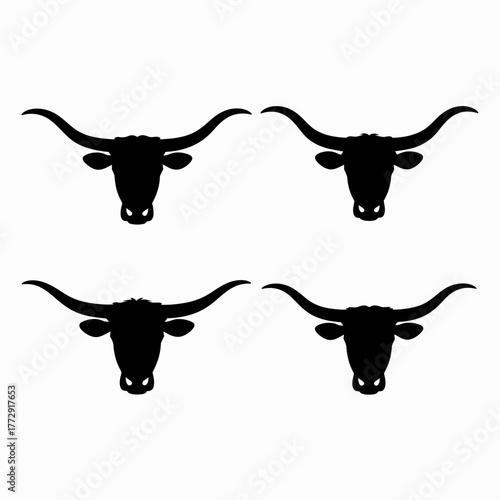 Four black silhouettes of longhorn cattle heads with large horns