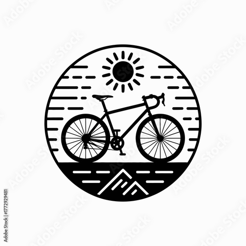 Retro bicycle riding under the sun in a mountain landscape circle emblem